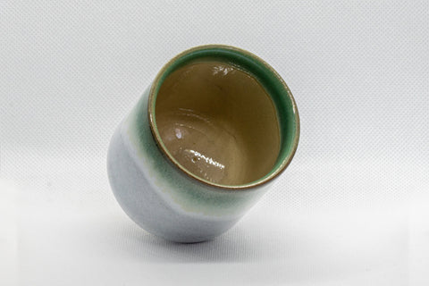 Tezumi — Japanese Teacup - Agano-yaki - Green Tsutsu-gata Yunomi - 180ml — tipped to show the interior
