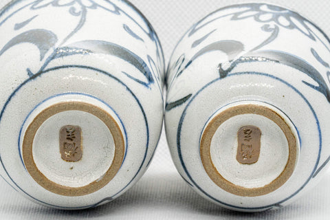 Japanese Teacups - Pair of Floral Tsutsu-gata Yunomi - 150ml - both cups on their sides showing the foot rings