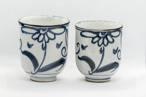 Japanese Teacups - Pair of Floral Tsutsu-gata Yunomi - 150ml - front view of the pair of teacups with blue floral design