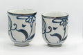 Japanese Teacups - Pair of Floral Tsutsu-gata Yunomi - 150ml - the pair showing the blue underglaze floral painting