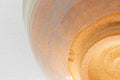 Tezumi — closeup of the glazed interior base of the Nishio Kashu Shigaraki-yaki gohonte chawan