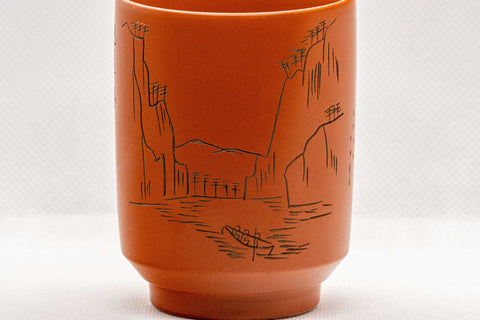 Japanese Teacup - Mountainous Tsutsu-gata Tokoname-yaki Yunomi - 150ml - closeup of the engraved boat-and-mountains river scene