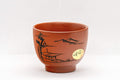 Japanese Teacups - Pair of Tokoname-yaki Senchawan - 60ml - angled view showing the engraved landscape decoration