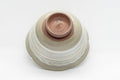 Tezumi — Japanese Teacup - Hakeme Momo-gata Yunomi - 120ml — tipped to show the interior