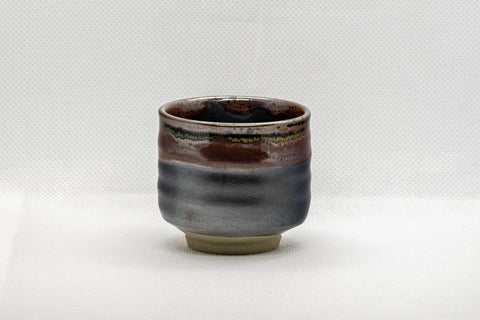 Japanese Teacup - Tenmoku Glazed Tsutsu-gata Yunomi - 65ml - front view showing the red and black tenmoku glaze at the lip