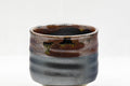 Japanese Teacup - Tenmoku Glazed Tsutsu-gata Yunomi - 65ml - closeup of the ribbed body and tenmoku-glazed lip