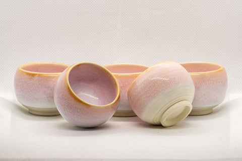 Japanese Teacups - Set of 5 Sakura Nagashi Wa-nari Guinomi - front view of the set with one cup resting on its side