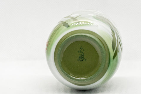 Japanese Teacups - Meoto Pair of Green Floral Yunomi - one teacup tilted to show the interior and footring