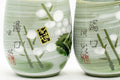 Japanese Teacups - Meoto Pair of Green Floral Yunomi - closeup of the pair showing the floral decoration