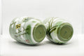 Japanese Teacups - Meoto Pair of Green Floral Yunomi - the pair inverted showing the footrings