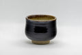 Japanese Teacup - Tsukaru Nasu-gata Guinomi - 50ml - front view of the black glazed cup