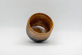 Japanese Teacup - Drip-Glazed Guinomi - 35ml - tilted view showing the amber-glazed interior