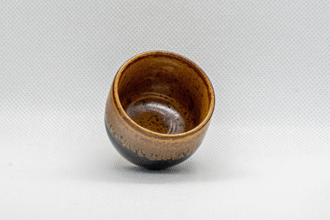 Japanese Teacup - Drip-Glazed Guinomi - 35ml - tilted view showing the amber-glazed interior