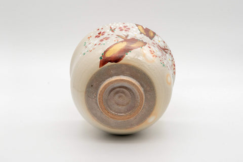 Japanese Matcha Bowl - Torasuke Kyo-yaki Komogai-nari Chawan - angled view showing the painted sakura blossoms
