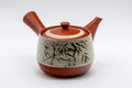 Japanese Kyusu - Tokoname-yaki Teapot with Bamboo Scene - 300ml - three-quarter view of the red Tokoname-yaki side-handle teapot with bamboo decoration, lid on
