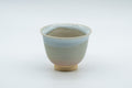 Japanese Teacups - 天鵬山 Tsubaki Kiln - Pair of Beige Glazed Hagi-yaki Yunomi - 85ml - front view of a single teacup