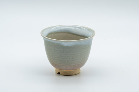 Japanese Teacups - 天鵬山 Tsubaki Kiln - Pair of Beige Glazed Hagi-yaki Yunomi - 85ml - angled view of a single teacup