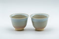 Japanese Teacups - 天鵬山 Tsubaki Kiln - Pair of Beige Glazed Hagi-yaki Yunomi - 85ml - front view of the pair of beige-glazed teacups