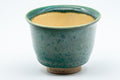 Japanese Teacup - Green Yuteki Glazed Koishiwara-yaki Yunomi - 90ml - view from above showing the cream glazed interior