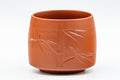 Japanese Teacups - Pair of Bamboo Hantsutsu-gata Tokoname-yaki Yunomi - 130ml - closeup of a single cup showing the carved bamboo design on the red clay
