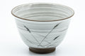 Japanese Teacups - Pair of White Glazed Yunomi with Long Grass Motifs - 100ml - closeup of a single cup showing the long grass motif