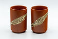 Japanese Teacups - Pair of Nerikomi Tsutsu-gata Tokoname-yaki Yunomi - front view of the pair showing the marbled diagonal gold stripe