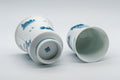 Japanese Teacups - Pair of 畑萬陶苑 Meoto Arita-gata Yunomi - the two teacups resting on their sides showing the interiors