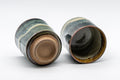 Japanese Teacups - Pair of Blue-Green Hare's Fur Glaze Tsutsu-gata Yunomi - 150ml - the two teacups resting on their sides showing the interiors