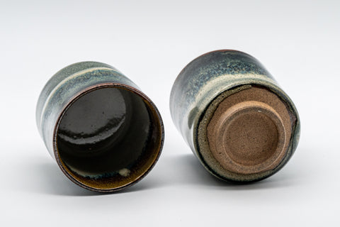 Japanese Teacups - Pair of Blue-Green Hare's Fur Glaze Tsutsu-gata Yunomi - 150ml - the two teacups tilted to show their unglazed feet