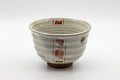 Japanese Matcha Bowl - White Red Brush Glazed Ido-gata Chawan - 400ml - front view of the milky white bowl with red brushwork decoration