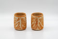 Japanese Teacups - Pair of Shino Glazed Tsutsu-gata Yunomi - 90ml - front view of the pair of ribbed cups side by side