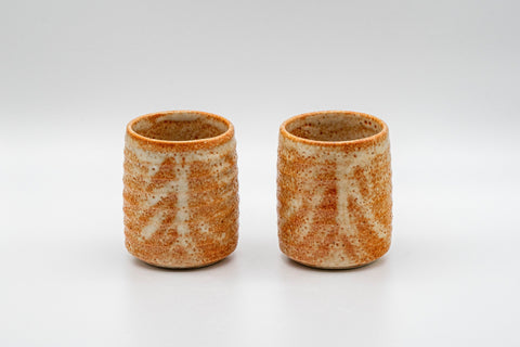 Japanese Teacups - Pair of Shino Glazed Tsutsu-gata Yunomi - 90ml - front view of the pair of ribbed cups side by side