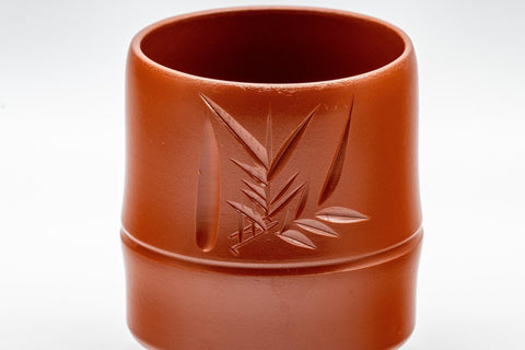 Japanese Teacups - Pair of 亮泉 朱泥 Tsutsu-gata Tokoname-yaki Yunomi - 140ml - closeup of a single cup showing the bamboo engraving and node detail