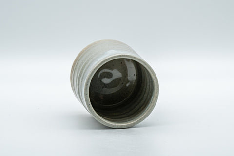 Tezumi — Japanese Teacup - Gohonte Tsutsu-gata Hagi-yaki Yunomi - 140ml — tipped on its side showing the glazed interior
