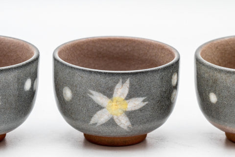 Japanese Teacups - Set of 3 Floral Snowflake Glazed Guinomi - 45ml - the three cups with one tipped to show the rose-coloured interior