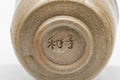 Japanese Teacup - Hare's Fur Stoneware Tsutsu-gata Yunomi - 185ml - closeup of the base showing the maker's stamp