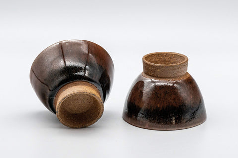Japanese Teacups - Pair of Tenmoku Glazed Sugi-nari Guinomi - 55ml - the two cups resting on their sides showing the undersides