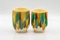 Japanese Teacups - Couple's Pair of 秀 Meoto Yunomi - 150ml - the matching pair of cream cups with multicolour drip glaze, front view