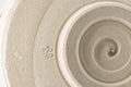 Japanese Matcha Bowl - Cream Glazed Hantsutsu-gata Chawan - 450ml - closeup of the underside spiral foot