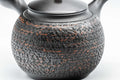 Japanese Kyusu - Tadaomi Kato, Koushin Kiln - Kurodei Tokoname-yaki Debeso Teapot - 250ml - side view showing the textured black clay