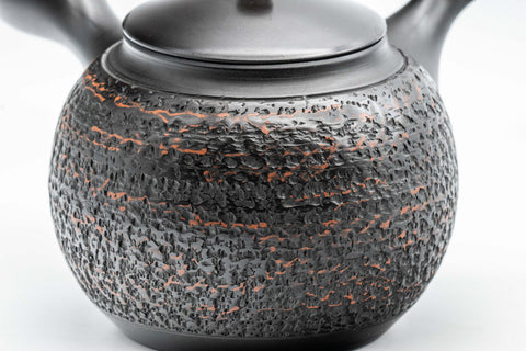 Japanese Kyusu - Tadaomi Kato, Koushin Kiln - Kurodei Tokoname-yaki Debeso Teapot - 250ml - side view showing the textured black clay
