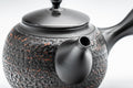Japanese Kyusu - Tadaomi Kato, Koushin Kiln - Kurodei Tokoname-yaki Debeso Teapot - 250ml - angled view of the textured surface