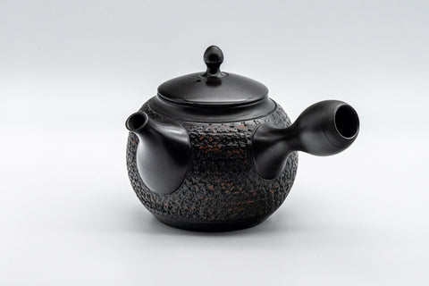 Japanese Kyusu - Tadaomi Kato, Koushin Kiln - Kurodei Tokoname-yaki Debeso Teapot - 250ml - front view of the textured black teapot