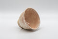 Japanese Teacups - Set of 3 Gohonte Hagi-yaki Yunomi - 140ml - angled view of a tipped cup