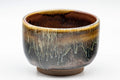 Japanese Teacups - Set of 3 Drip Glazed Yunomi - 120ml - front view of a single cup showing the yellow-brown drip glaze