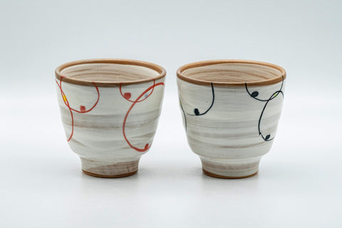 Japanese Teacups - Pair of Brush Glazed Hasami-yaki Yunomi - 170ml - three-quarter view of the pair of teacups