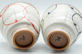 Japanese Teacups - Pair of Brush Glazed Hasami-yaki Yunomi - 170ml - the two cups upturned showing the unglazed footrings