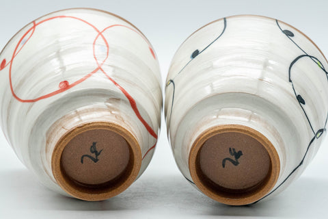 Japanese Teacups - Pair of Brush Glazed Hasami-yaki Yunomi - 170ml - the two cups upturned showing the unglazed footrings