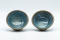 Japanese Teacups - Pair of Stoneware Asagao-gata Guinomi with Cyan Glazed Interior - 50ml - front view of the two grey stoneware cups