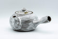 Tezumi — Floral brush-glazed kyusu teapot, side view with the spout to the right